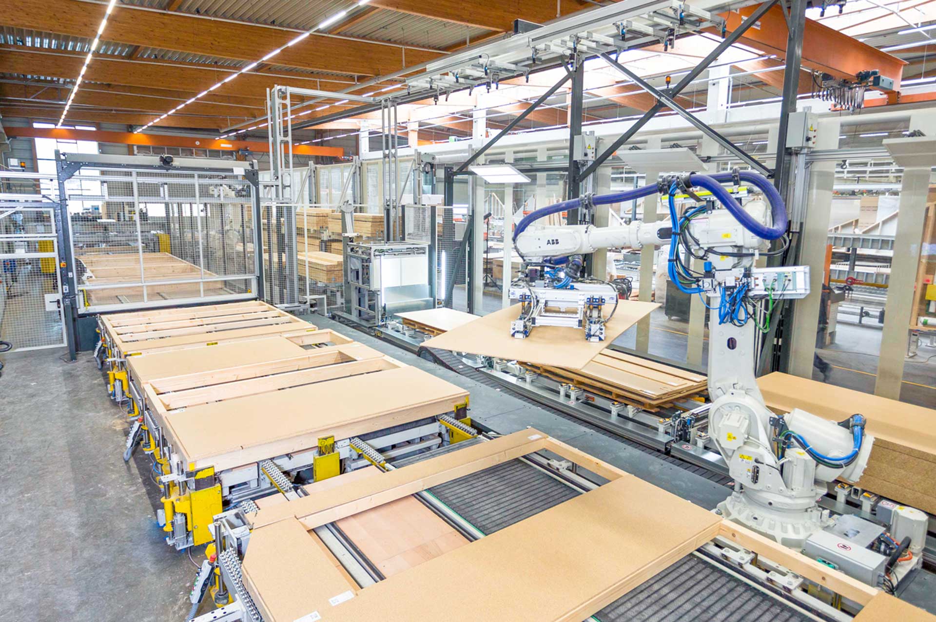 System zur automatisierten Beplankung von Wandelementen