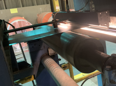 AxCIS contact image sensor mounted above steel strip for detection of holes